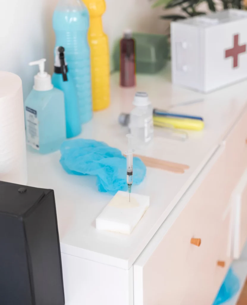 Medical supplies on a white table.